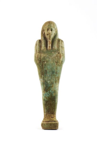  Five Egyptian funerary statuettes (Shabtis), Late Period (600 BC). Four faience...
