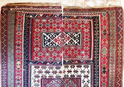  Pair of Central Anatolian Kilim rugs made up of two flat woven panels with ocher...