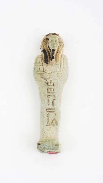 null Five Egyptian funerary statuettes (Shabtis), Late Period (600 BC). Four faience...