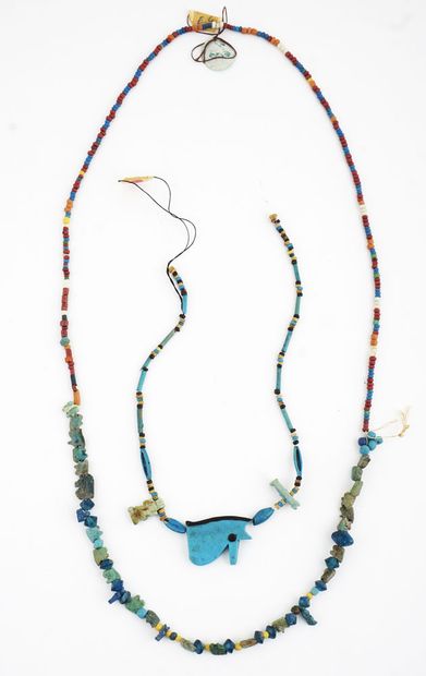 null Two Egyptian faience necklaces, one of which contains a glazed faience Wedjat...