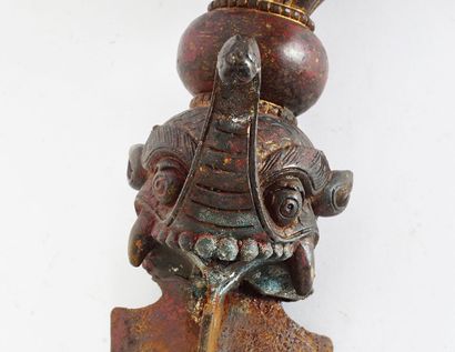 null PHURBA

A Sino-Tibetan Phurba adorned with three Mahakala heads, the crown forming...