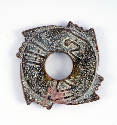 null Set of 16 archaic bi discs in various hard stones, some decorated with dragons,...