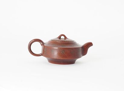 null TEAPOT

Yixing teapot, decorated with flowering prunus branches and bearing...