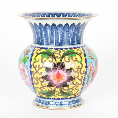 null Blue and white cloisonne "Flower Garden" bucket vase, Ch’eng-hua reign mark.

China,...