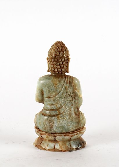 null BUDDHA

Figure of Buddha sitting in meditation, made of jade or serpentine.

9x19...
