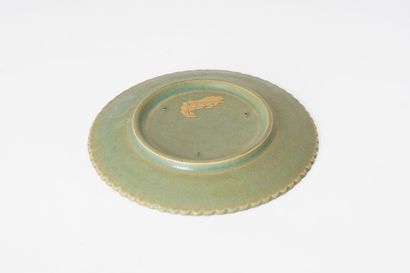 null PLATE

A celadon ceramic cup whose surface is covered with a cracked glaze,...
