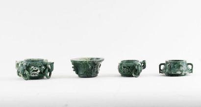 null VASE

Chinese vase in four pieces, made of green serpentine.

The largest piece...