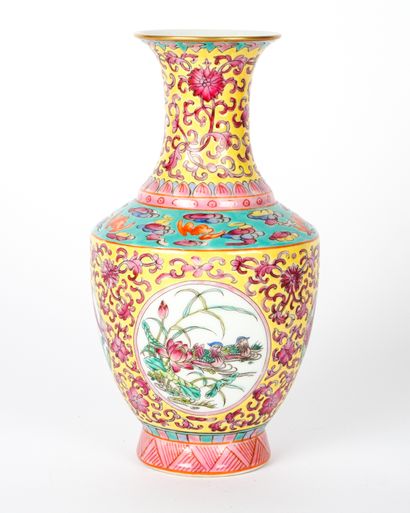 null Yellow ground famille rose "Bird Garden" Baluster Vase, Yung-cheng reign mark....