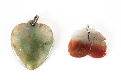 null AGATE JADIET

Two pendants, one in the shape of a heart in agate and the other...