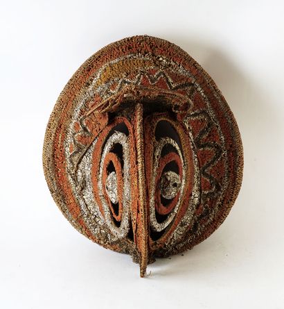null Papua New Guinea box gable mask depicting a stylized face, basketwork, clays...