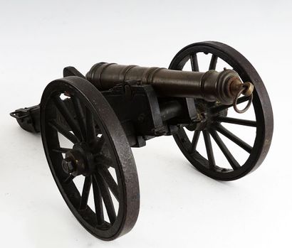 null Collection of cannons including a French alarm cannon, bronze barrel, on two...
