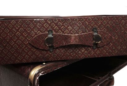 null Wooden travel trunk mounted on baluster feet lined with paper with gold and...