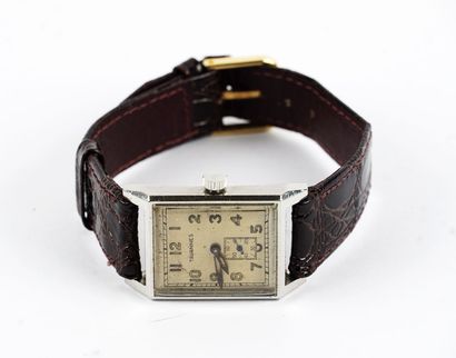 null TAVANNES / TAVANNES

Tavannes watch, rectangular steel case ,

cream dial with...