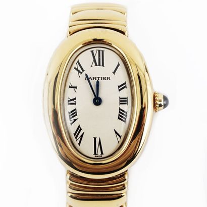 null CARTIER

Lady's wristwatch, Baignoire model in 18K gold, dial with Roman numerals...