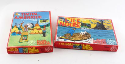 null LOMBARD / HERGÉ / HEMMA 

(1983-1985). Deux boites de deux puzzles de 120 morceaux...