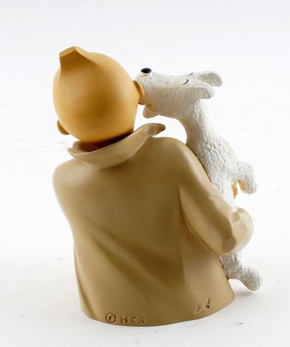 null LEBLON-DELIENNE 

Figurine de collection en résine polychrome « Tintin léché...
