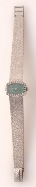 LONGINES Bracelet-montre de dame en or gris 18K (poinçonné), cadran vert dans un...