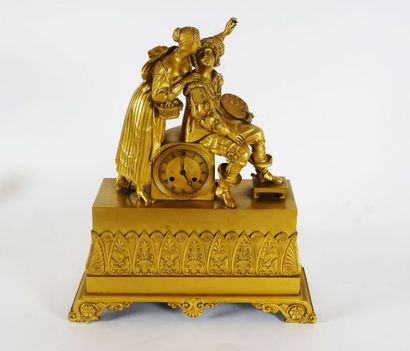 Figurative clock in gilded bronze Restoration;...