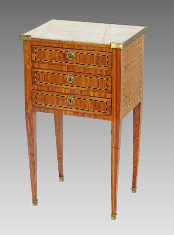  LOUIS XVI PERIOD BEDSIDE TABLE in marquetry, opens with three rows of drawers on...
