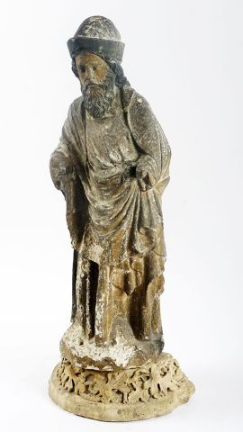  16th Century statue in carved and polychrome stone; 
it rests on a posterior base....