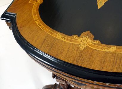 null Exceptional side table in marquetry and blackened wood;

in the center a lyre...