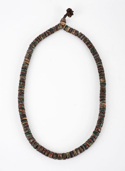 null NECKLACE TIBETAN

Tibetan necklace composed of beads in mixed materials, decorated...