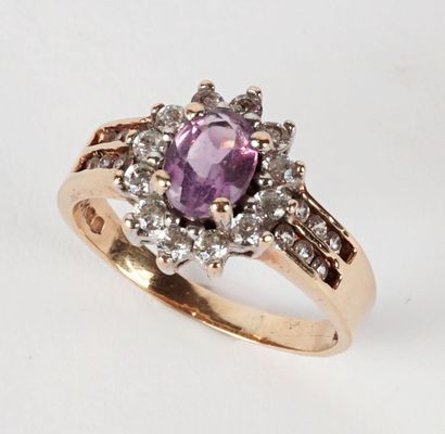 null 10K GOLD AMETHYST

10K yellow gold ring adorned with an amethyst in an entourage...