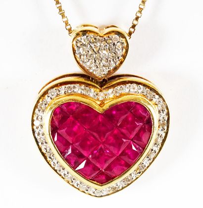 null 14K GOLD RUBIES DIAMONDS

Pendant in 14K yellow and white gold in the shape...