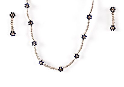null 18K GOLD SAPPHIRES DIAMONDS

Necklace and earrings set in 18K white gold.

Necklace...
