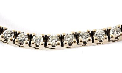 null OR 14K DIAMANTS / 14K GOLD DIAMONDS

Bracelet tennis en or 14K orné de 72 diamants...