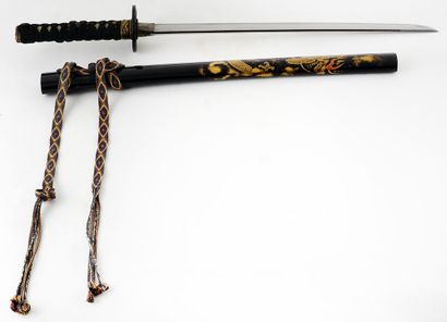 null SABRE JAPONAIS / JAPANESE SWORD

A japanese sword with a lacquered wood scabbard.

Japan,...