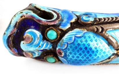null DRAGON

Silver plated and enamelled turquoise metal bracelet, the ends taking...