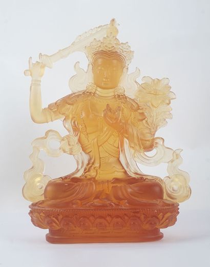  WENSHU PUSA 
Statuette of Wenshu Pusa (Manjushri) in tinted glass. China, 20th century....