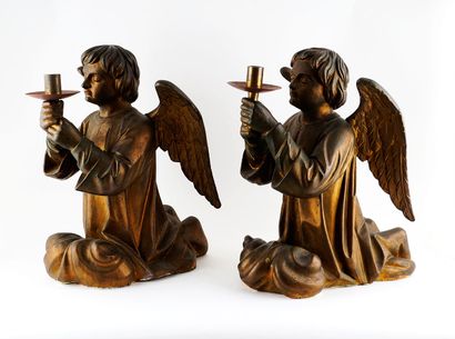 null Pair of wooden and metal candlesticks in the shape of a ceroferous angel. The...