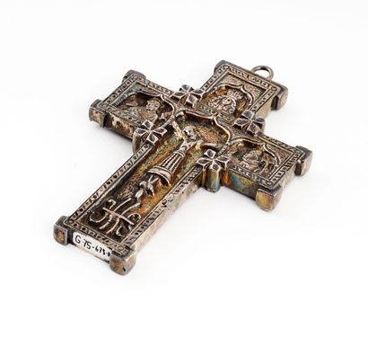 null Very ornate pendant in the shape of a Latin cross, made of a metal alloy containing...