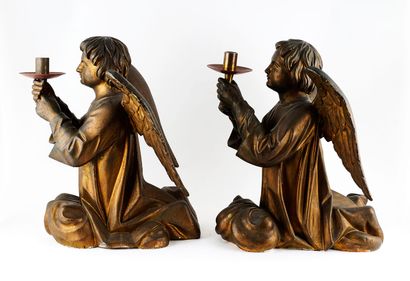 null Pair of wooden and metal candlesticks in the shape of a ceroferous angel. The...