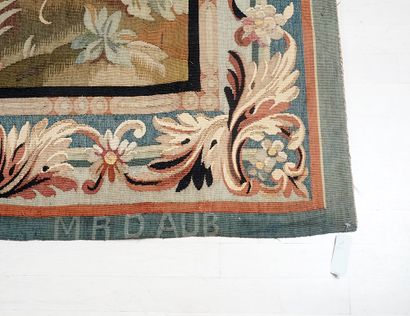 null Aubusson tapestry, decorated with a rooster in the foreground, a fountain, and...