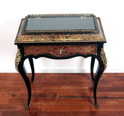 null Table showcase in marquetry of Boule style, in bronze leaves on black and red...