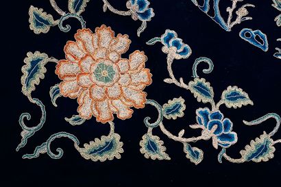 null 
Table cover, Chinese tapestry showing figures and a flower in the center in...