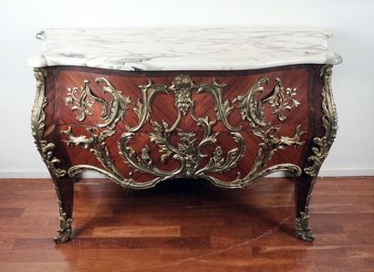 null Louis XV style chest of drawers in marquetry, gilded bronze ornaments, the top...