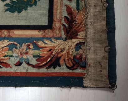 null Aubusson tapestry, decorated with a rooster in the foreground, a fountain, and...