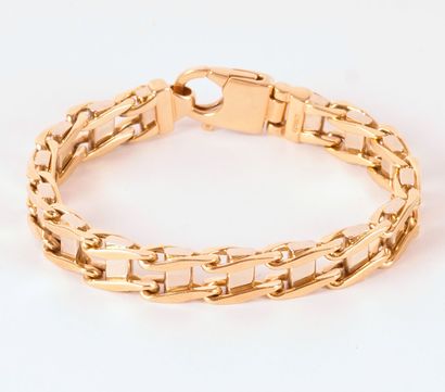 null 14K GOLD
Articulated bracelet in 14K yellow and white gold.
Gross Weight: 65.0g
Length:...