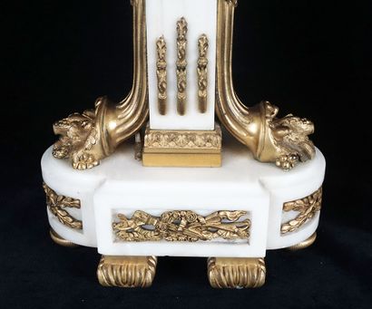 null Pair of gilt bronze and white marble candelabras, with four sconces, Louis XVI...