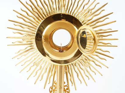 null Monstrance in gilded metal, rests on a tripod baluster foot. In its original...
