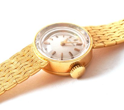 null MOVADO 18K GOLD WATCH
Movado lady's wristwatch in 18K gold, round case.
Gross...