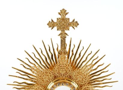 null Monstrance in gilded metal, rests on a tripod baluster foot. In its original...