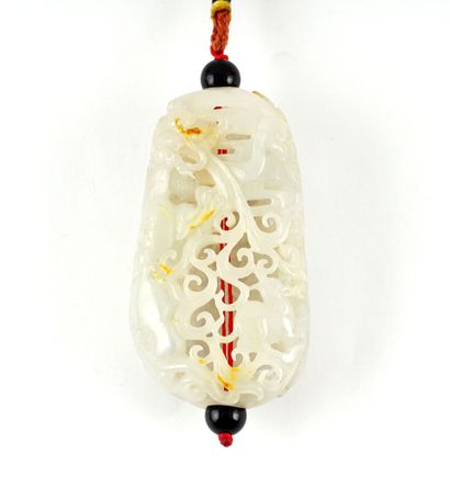 null JADE



Pendant finely carved in white jade slightly veined with rust. 

China,...