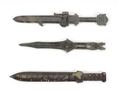 null JADE

Group of three jade ceremonial dagger. 

Lenght : 28cm or 11"