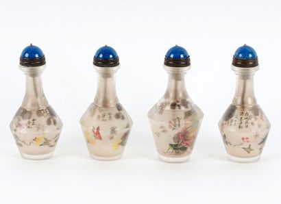 TABATIÈRE / SNUFF BOTTLE

A set of four crystal...