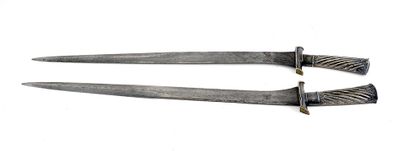 null ASIE DU SUD-EST / SOUTHEAST ASIA

Double-bladed damascus steel sword, the scabbard...